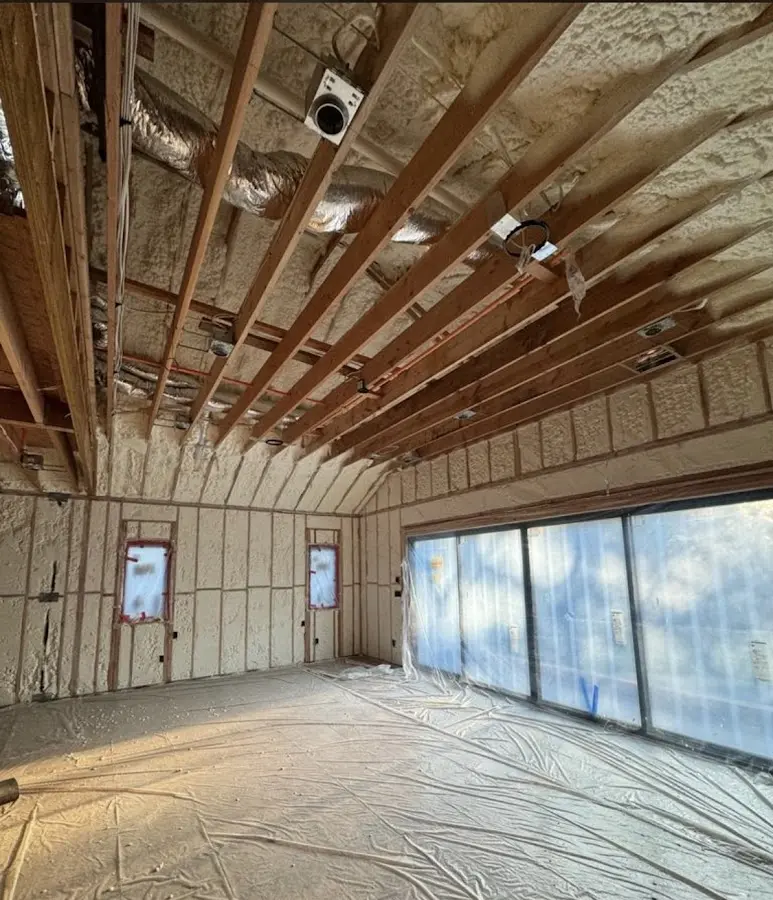 Interior walls and ceiling insulated with spray foam during new construction in Lemoore